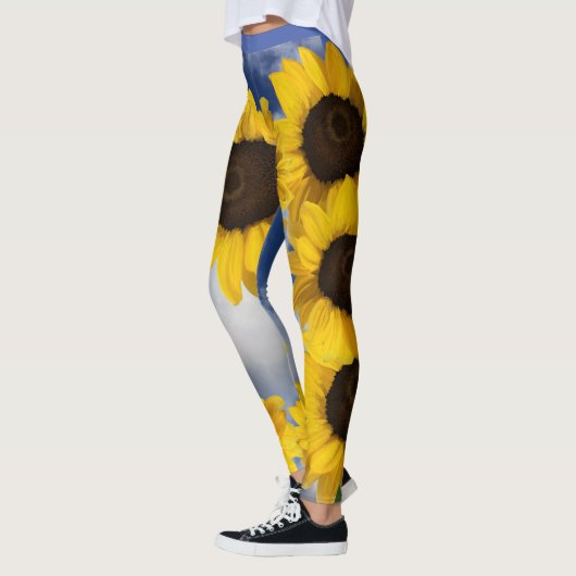 Hellgelber und blauer Sonnenblumenhimmel Leggings (Links)