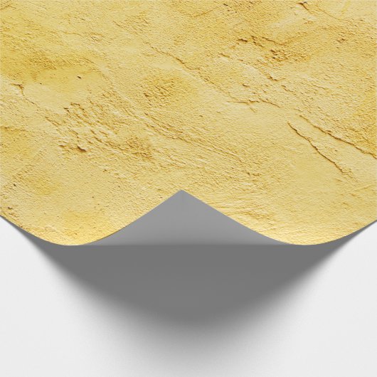 hellgelbes abstrakt strukturiertes Gips an der Wan Geschenkpapier (Ecke)