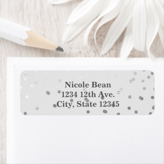 Hellgrauer u. silberner glänzender Confetti (Insitu)