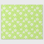 Hellgrüne Retropolka-Punkte mit Blumenmuster Geschenkpapier (Flach)