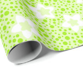 Hellgrüne Retropolka-Punkte mit Blumenmuster Geschenkpapier (Rolleneckpunkt)