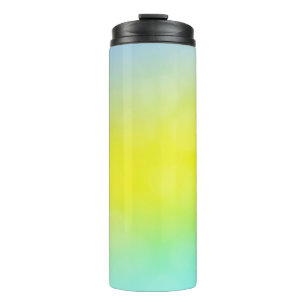 Hellgrüner, gelber, abstrakt verschwommener Hinter Thermosbecher