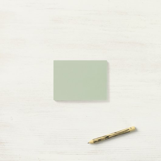 Hellgrüner Massivfarbe Post-it Klebezettel (Auf Schreibtisch)