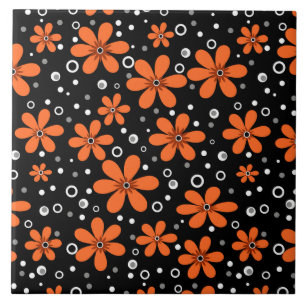 Hellorange Blume auf schwarzem Hintergrund mit w Fliese