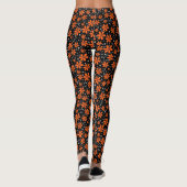 Hellorange Blume auf schwarzem Hintergrund mit w Leggings (Rückseite)