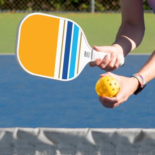 Hellorange-gelbe, blaue Streifen Pickleball Schläger (InSitu)
