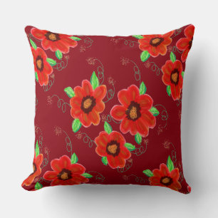 Hellorange Rote Blume auf dunkler Himbeere Kissen