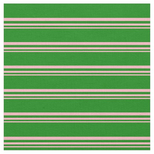 Hellrosa und grüne Streifen Stoff (Nahaufnahme)