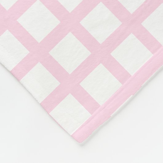 Hellrosa, weiße Quadrat-Muster Fleecedecke (Ecke)