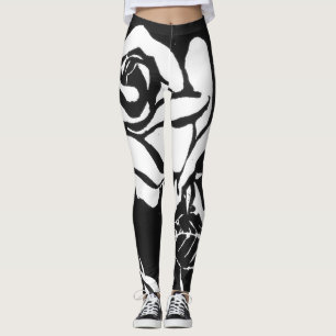 Hellweiße Holzschnitt-Rose auf schwarzem Hintergru Leggings