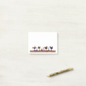 Hennen in einer Reihe Post-it Klebezettel (Auf Schreibtisch)