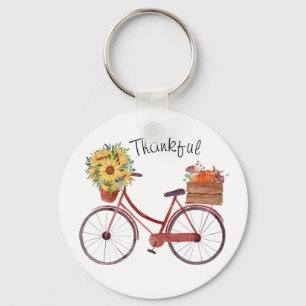 Herbst. Vintage-Fahrrad mit Kürbissen und Sonnenbl Schlüsselanhänger