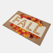 Herbstbauernhaus farbige Herbstblätter auf Burlap Fußmatte (Schrägansicht)