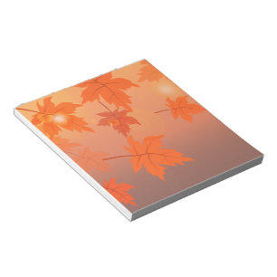 Herbstdesign mit Ahornblättern und Bokeh-Effekt   Notizblock