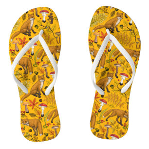 Herbstfüchse auf Orange Badesandalen