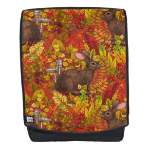 Herbstkaninchen auf rot rucksack