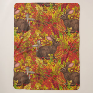 Herbstkaninchen auf Rot Sherpadecke