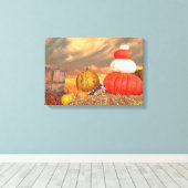 Herbstkürbis auf Heuballen mit Sonnenuntergang Leinwanddruck (Insitu (Holzboden))
