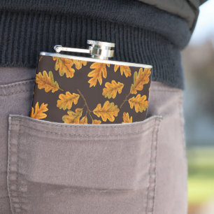 Herbstliche Eichenblätter auf dunkelbraun Flachmann