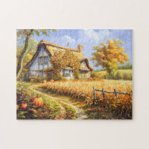 Herbstliche Hütte durch Weizenfeld und Pumpkins