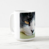 Hermosa Gatita descansando Kaffeetasse (Vorderseite Links)