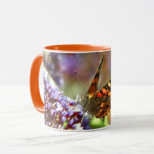 Hermosa Mariposa polinizando flores Tasse (Vorderseite Links)