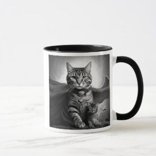 Heroische Katze mit Umhang und Kätzchen. Tasse