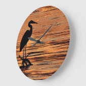 Heron bei Sunset Große Wanduhr (Winkel)