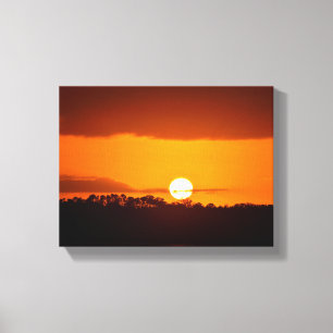 Herrlicher Sonnenuntergang über dem Fluss Leinwanddruck