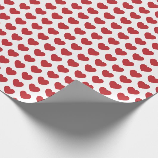 Herz, dunkles Rot auf weißem Umschlagpapier Geschenkpapier (Ecke)