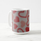 Herz gemusteter Becher anders als andere Kaffeetasse (Vorderseite Links)