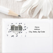 Herz-Piano-Tastatur und Musiknoten-Label (Insitu)