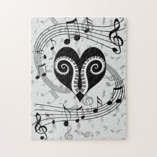 Herz- und Klavierschlüssel der musikalischen Puzzle