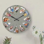 Herzförmige Fotos Grüne Runde Große Wanduhr<br><div class="desc">Erstellen Sie Ihre eigene Multi-Foto-Uhr. Die Bildvorlage ist für Sie ein Set, um 12 Fotos hinzuzufügen, die in einem herzförmigen Rahmen angezeigt werden. Das Design verwendet porträtierte vertikale Fotos für alle Zahlen außer 3 und 9, die im Querformat horizontal angeordnet sind. Die Farbpalette ist grün und olivgrün, oder Sie können...</div>