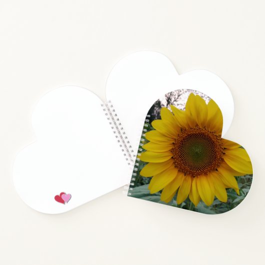 Herzförmiges Notizbuch mit leuchtender Sonnenblume (Innenseite)
