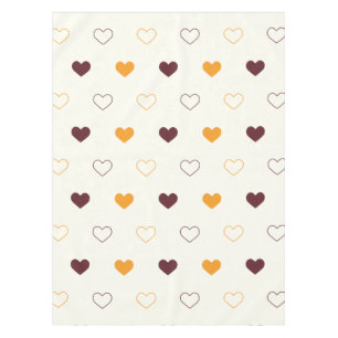 Herzmuster mit orangefarbenen und braunen Herzen Tischdecke