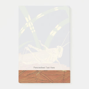 Heuschrecke im grünen Gras auf blauem Hintergrund Post-it Klebezettel