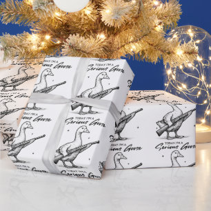 Heute bin ich ein ernster Gänsehiebhaber, der mit  Geschenkpapier