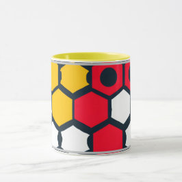 Hexagonen aus roter und gelber Tasse