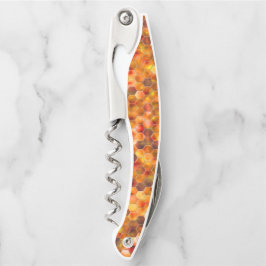 Hexagonmosaik an Stellen in rötlichen Tönen werfen Kellnermesser