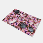 Hexagons, umgeben von rosa blütenähnlichen Formen Fußmatte (Schrägansicht)