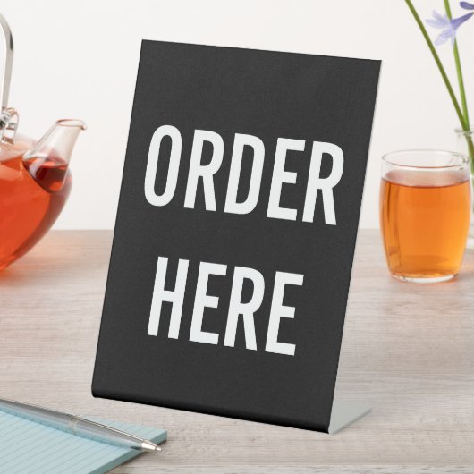 HIER BESTELLEN SOCKELSCHILD (In Situ)