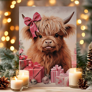 Highland-Kuh mit rosa Schleife Weihnachten