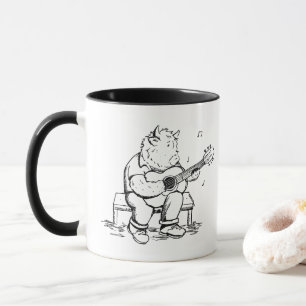 Highland-Kuh spielt akustische Gitarre Tasse