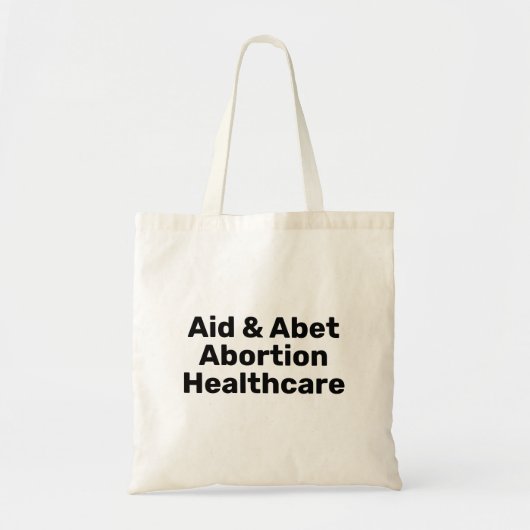 Hilfe & Abet Abortion Gesundheitswesen schwarze Ty Tragetasche (Vorne)