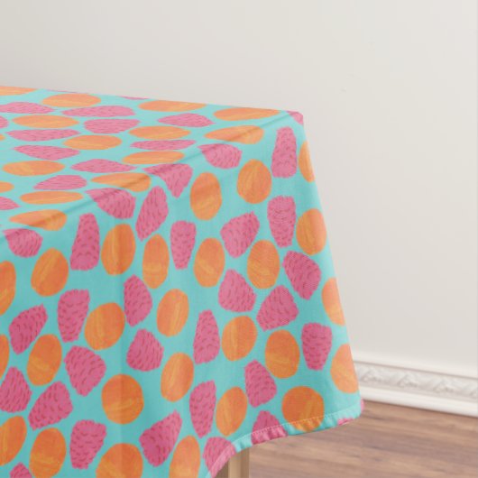 Himbeeren-Mandarinen auf helltürkis blau Tischdecke (Beispiel)