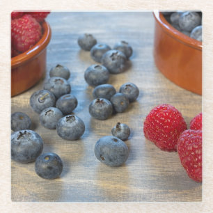 Himbeeren und Blaubeeren Glasuntersetzer