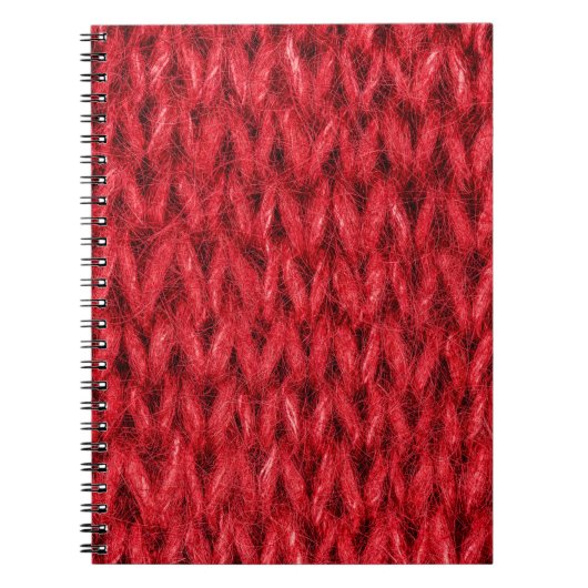 Hintergrund aus roter Strickwolle. Notizblock (Vorderseite)