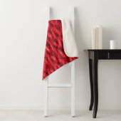 Hintergrund aus roter Strickwolle. Sherpadecke (Beispiel)