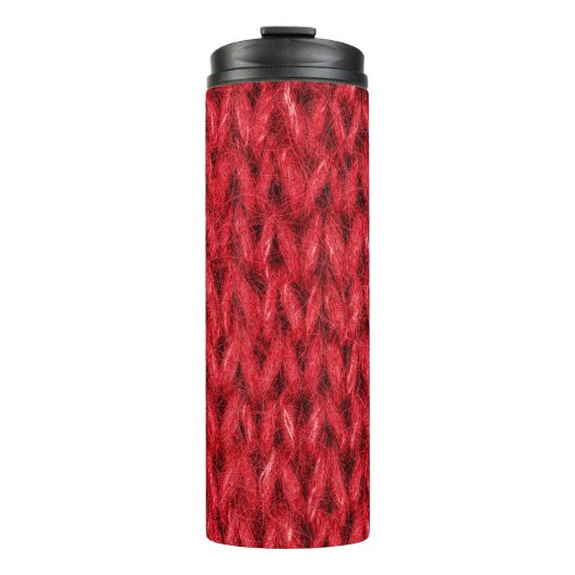 Hintergrund aus roter Strickwolle. Thermosbecher (Vorderseite)